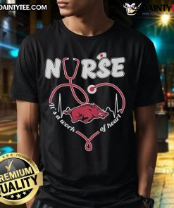 Official Arkansas Razorbacks Nurse 'It's A Work Of Heart' T-Shirt featuring logo, perfect for fans and healthcare workers.