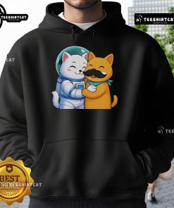 Cozy Official Astrocat and Meow Stash Hoodie displayed on a hanger, featuring vibrant cat graphics and a stylish design.