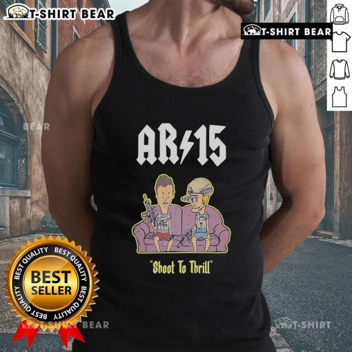 Beavis and Butt-Head AR-15 Shoot to Thrill tank top displayed on a sofa, showcasing vibrant artwork and stylish design.