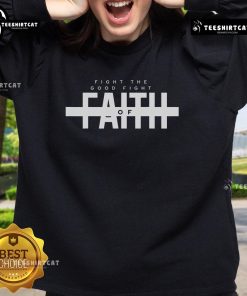 Official Bible Verse 'Fight the Good Fight of Faith' Christian sweatshirt featuring bold text and a stylish design.