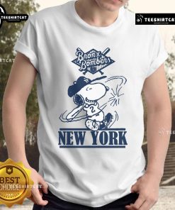 Official Bronx Bombers Snoopy New York Yankees baseball T-shirt featuring Snoopy in Yankees gear, perfect for fans.
