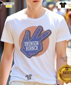 Alt Text: Official Brunson Burner New York Knicks T-Shirt featuring vibrant team colors and player graphics for fans.