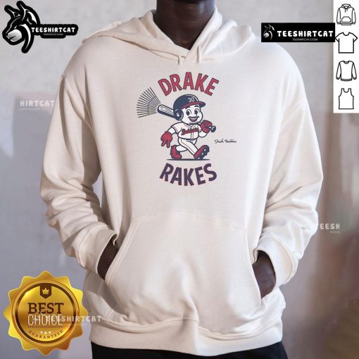 Drake Baldwin wearing the Official Drake Rakes Hoodie, showcasing a stylish urban look in a vibrant street setting.