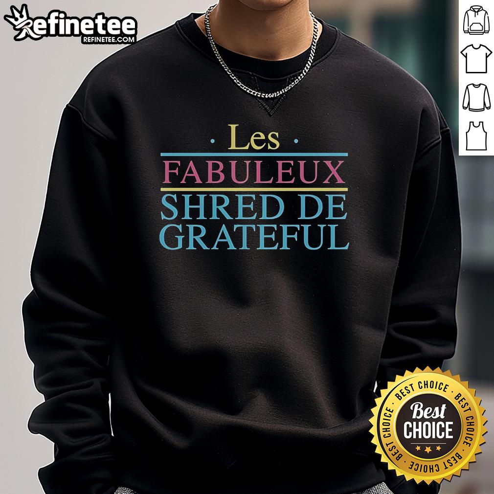 Official Grateful Shred Les Fabuleux Shred De Grateful Sweatshirt Alt Text: Official Grateful Shred Les Fabuleux Shred de Grateful sweatshirt displayed on a wooden background.