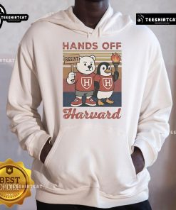 Steve Kerr wearing a Hands Off Harvard hoodie during an anti-Trump protest, promoting political activism and awareness.