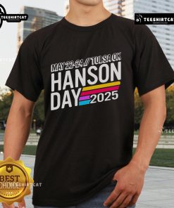 Alt Text: Official Hanson Day T-Shirt for May 22-24, 2025, in Tulsa, OK featuring vibrant design and event details.