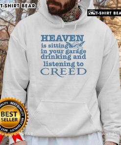 Cozy hoodie featuring 'Heaven Is Sitting In Your Garage Drinking And Listening To Creed' design, perfect for casual wear.