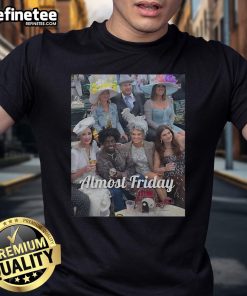 Alt Text: Official Kodak Derby Almost Friday T-Shirt featuring a vibrant graphic design perfect for casual wear and Derby events.