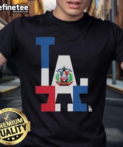 Alt Text: Official Los Angeles Dodgers Dominican Republic flag logo t-shirt featuring vibrant colors and a stylish design.