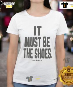 Alt Text: Official Mike Spike 'It Must Be The Shoes' Just Kickin' It Ladies Tee featuring a stylish design and vibrant colors.