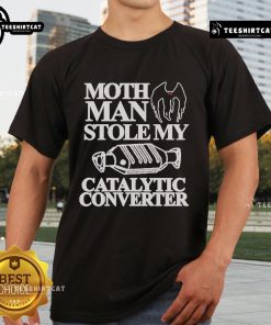 Official Mothman Stole My Catalytic Converter T-Shirt featuring a unique design and humorous text for enthusiasts.