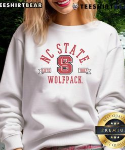 Official NC State Estd 1887 Wolfpack Sweatshirt in red, featuring logo and comfortable design for fans and students.