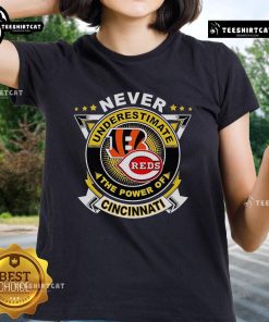 Official Cincinnati Sports Ladies Tee showcasing 'Never Underestimate The Power' slogan in vibrant colors.