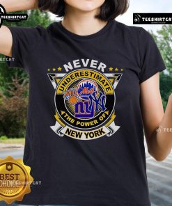 Official Never Underestimate The Power Of New York Sports Ladies Tee featuring a bold design and vibrant colors.