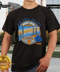 Official New York Knicks Basketball 2025 Playoffs Game Day T-Shirt featuring team logo and vibrant colors for fans.