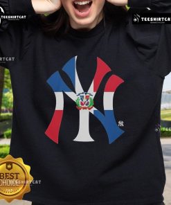 Alt Text: Official New York Yankees sweatshirt featuring Dominican Republic flag logo, perfect for fans and collectors.