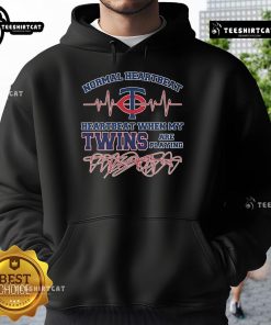 Cozy hoodie featuring 'Official Normal Heartbeat' design for Minnesota Twins fans, perfect for game days and cheering.