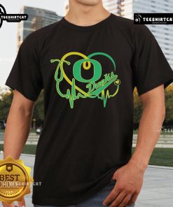 Official Oregon Ducks Caring Heartbeat Nurse T-Shirt featuring a heart and pulse design in team colors for nurses and fans.