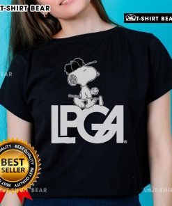 Official Peanuts X LPGA Snoopy Ladies Tee featuring a fun Snoopy design, perfect for golf enthusiasts and fans.