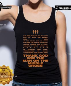 Alt Text: Rhett Walker wearing a tank top with Thank God For The Man On The Middle Cross design, showcasing faith and gratitude.