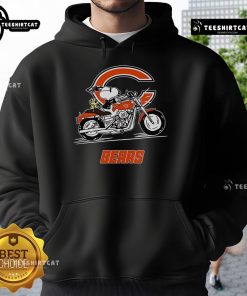 Alt Text: Snoopy and Woodstock driving a motorbike on a Chicago Bears hoodie, showcasing vibrant colors and playful design.