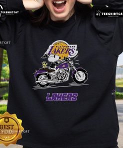 Official Snoopy and Woodstock driving a motorbike on a Los Angeles Lakers sweatshirt, perfect for fans and collectors.