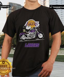 Alt Text: Official Snoopy and Woodstock driving motorbike on Los Angeles Lakers T-shirt, fun and vibrant design for fans.