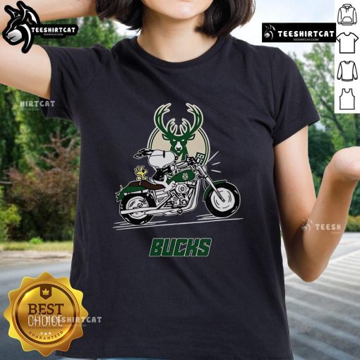Official Snoopy and Woodstock driving motorbike on Milwaukee Bucks ladies tee, perfect for fans and fashion lovers.