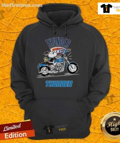 Alt Text: Snoopy and Woodstock riding a motorbike on an Oklahoma City Thunder hoodie, showcasing playful sports fashion.