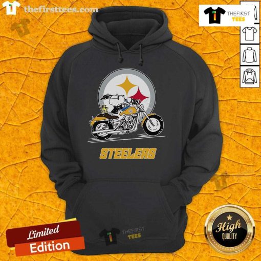 Alt Text: Snoopy and Woodstock riding a motorbike in a Pittsburgh Steelers hoodie, showcasing team spirit and fun.