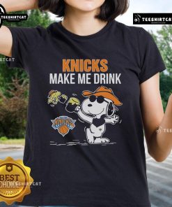 Official Snoopy and Woodstock New York Knicks 'Make Me Drink' Ladies Tee featuring playful graphics and team colors.