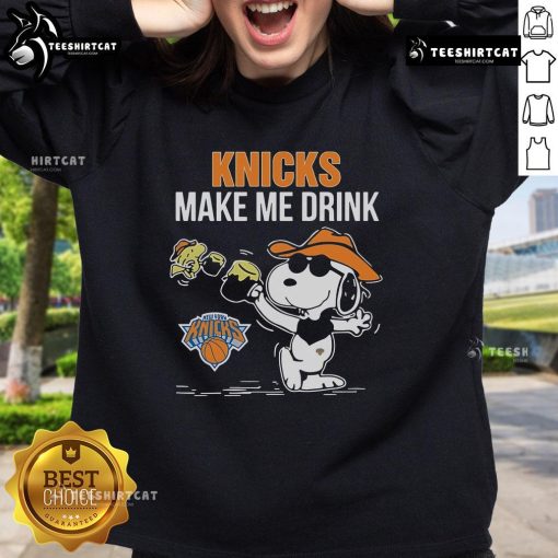 Alt Text: Official Snoopy and Woodstock New York Knicks Make Me Drink sweatshirt featuring vibrant graphics and cozy design.