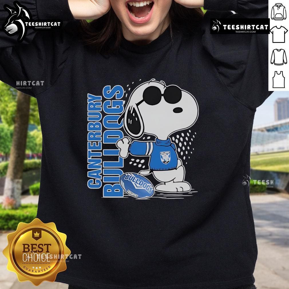 Official Snoopy Fan Canterbury Bankstown Bulldogs X The Peanuts Sweatshirt Official Snoopy Fan Canterbury Bankstown Bulldogs X The Peanuts Sweatshirt featuring vibrant graphics and cozy design.