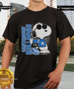 Alt Text: Official Snoopy Fan Canterbury-Bankstown Bulldogs X The Peanuts T-Shirt featuring Snoopy and Bulldogs logo design.