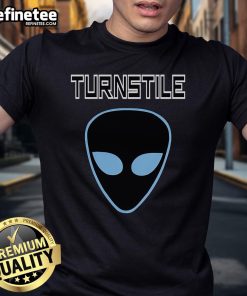 Official Turnstile Alien T-Shirt featuring a vibrant alien graphic, perfect for fans of the band and unique streetwear.