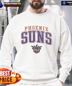 Official Tyla wearing a Phoenix Suns sweatshirt, showcasing team spirit and stylish sportswear fashion.