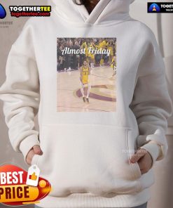Alt Text: Tyrese Haliburton wearing an Indiana Pacers Big Nuts Almost Friday hoodie, showcasing team spirit and style.