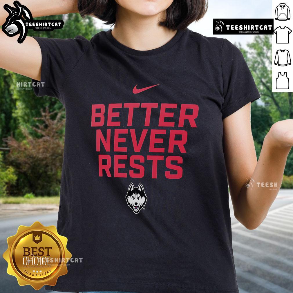 Official Uconn Huskies Better Never Rests Ladies Tee Alt Text: Official UConn Huskies Better Never Rests ladies tee featuring a stylish design perfect for fans and casual wear.