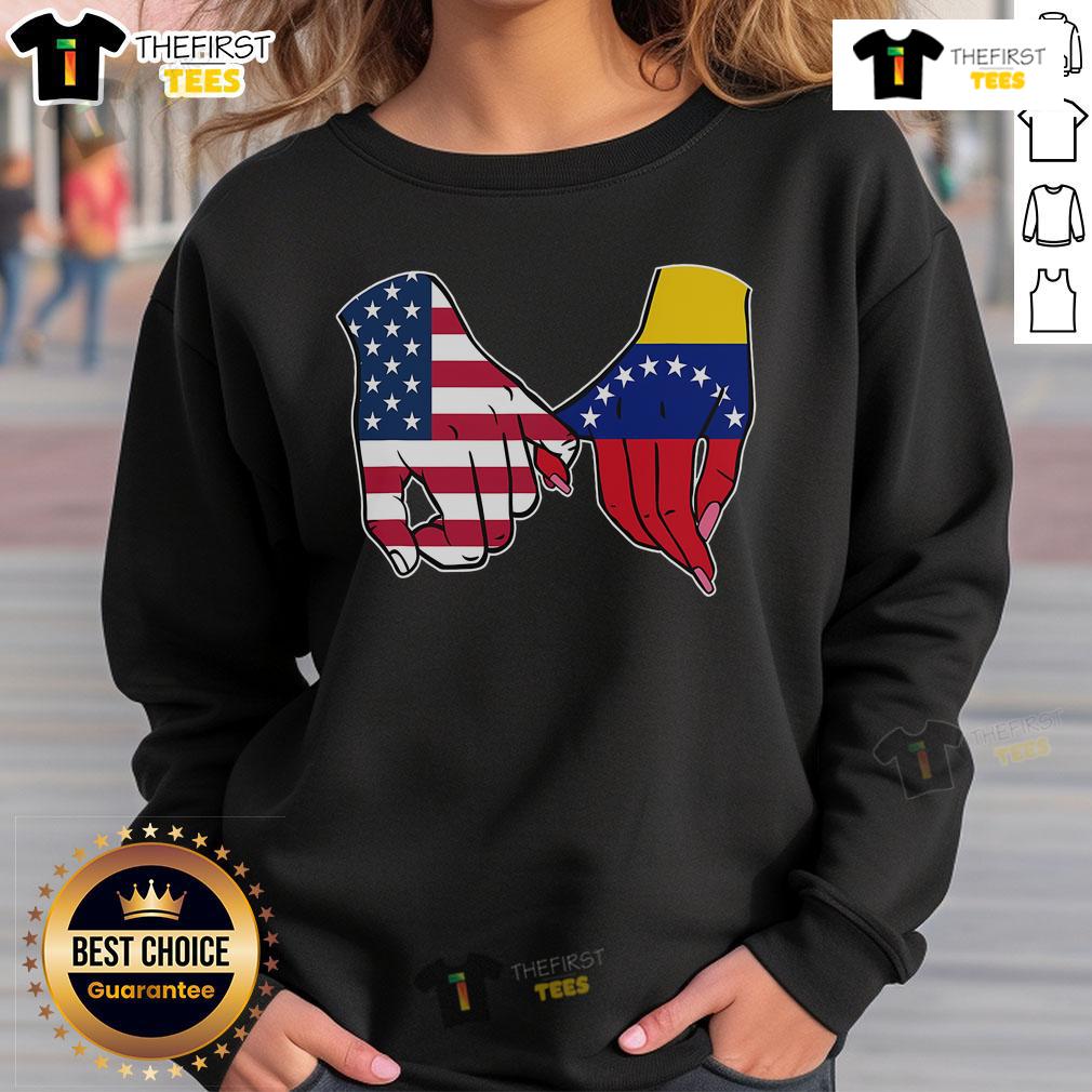 Official Usa And Venezuela Flags Hands Together Sweatshirt Alt Text: Official USA and Venezuela flags hands together sweatshirt showcasing unity and cultural pride.
