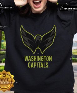Official Washington Capitals highlight reel sweatshirt showcasing team logo and vibrant colors for fans.