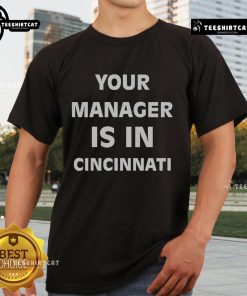 Official Your Manager Is In Cincinnati T-Shirt featuring bold graphic design, perfect for fans and team spirit enthusiasts.