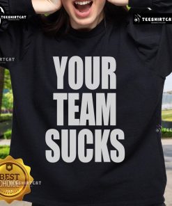 Official Your Team Sucks Sweatshirt in black, featuring bold white text, perfect for sports fans and team rivalries.