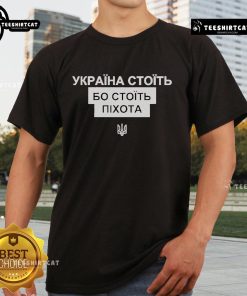 Alt Text: Official Zelenskyy Ukraine Stands T-Shirt featuring a bold design symbolizing support for infantry and Ukrainian resilience.