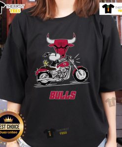 Snoopy and Woodstock riding a motorbike on a Chicago Bulls ladies tee, showcasing fun and vibrant cartoon design.