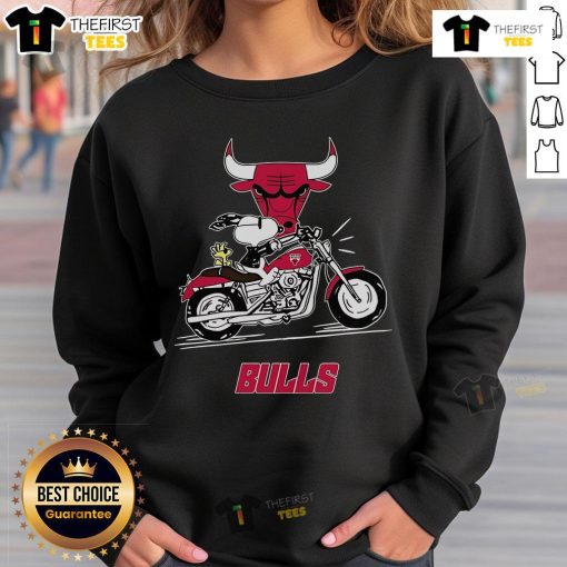 Alt Text: Original Snoopy and Woodstock driving a motorbike on a Chicago Bulls sweatshirt design, showcasing vibrant colors and playful imagery.