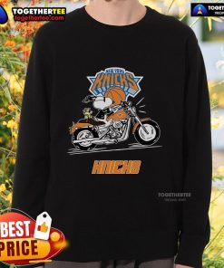Alt Text: Snoopy and Woodstock driving a motorbike on a New York Knicks sweatshirt, showcasing a fun and vibrant design.