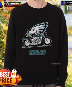 Alt Text: Original Snoopy and Woodstock driving a motorbike on a Philadelphia Eagles sweatshirt design.