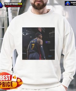 Buddy Hield in Original Warriors sweatshirt, showcasing unique style and team spirit on the basketball court.