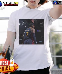 Buddy Hield sports an 'Excluding Buddy' T-shirt, showcasing his unique style as a member of the Original Warriors.