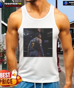 Buddy Hield wearing an Original Warriors tank top, showcasing his unique style and team spirit on the court.